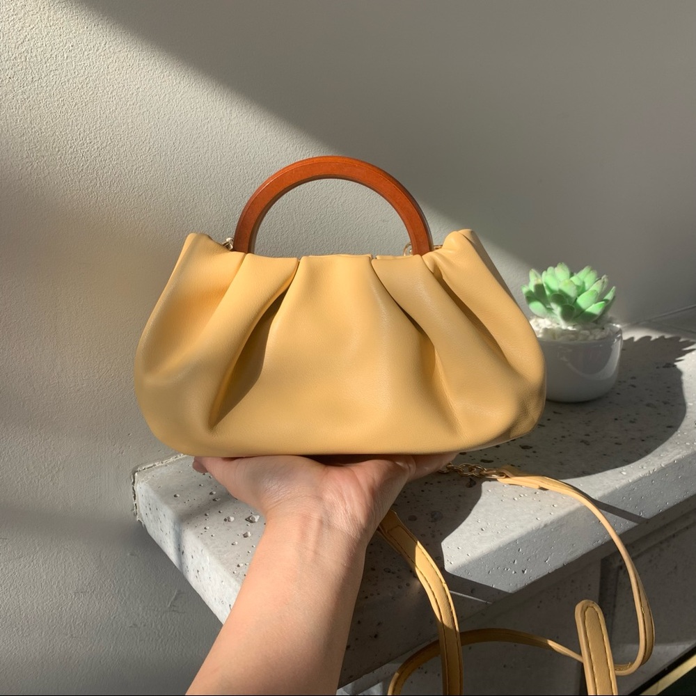Super cute crossbody bag with wood handles